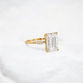 gleam-of-grace-emerald-pave-fire-moissanite-engagement-ring-2-50-ct-yellow-gold-gemfora-2